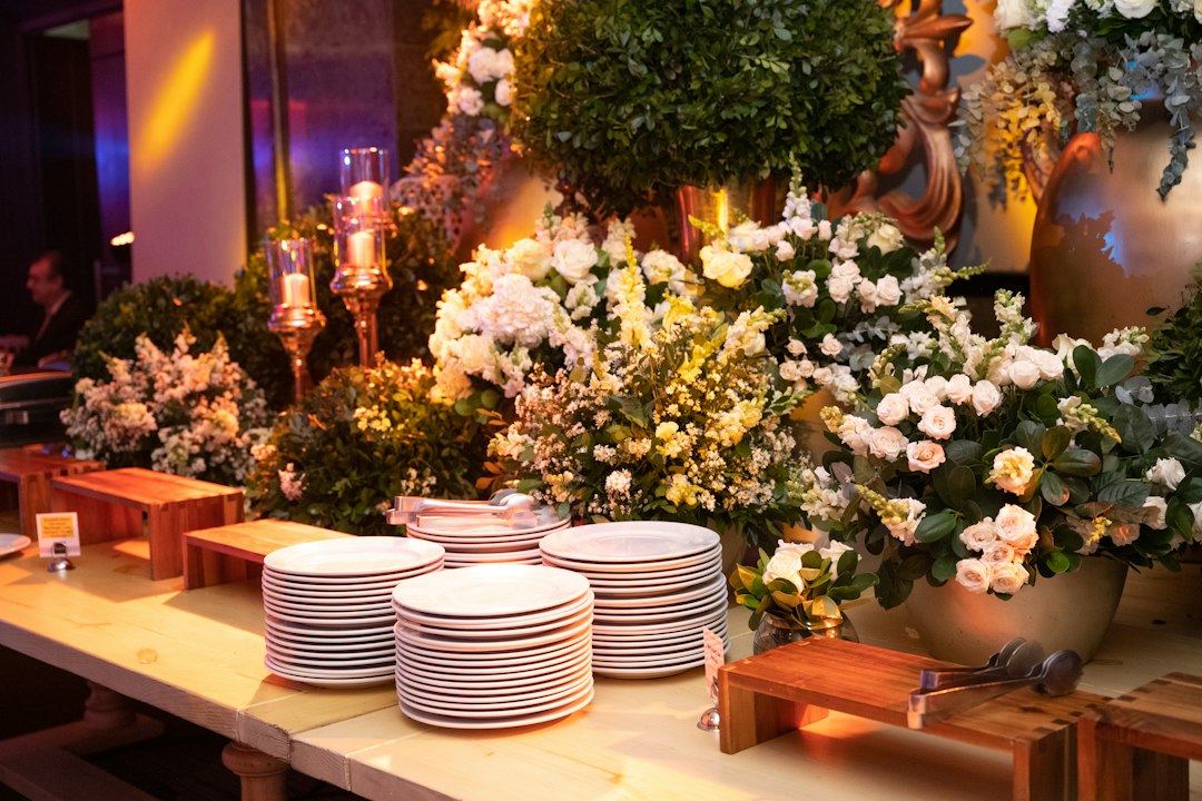 Professional catering event with elegantly set table and formal place settings